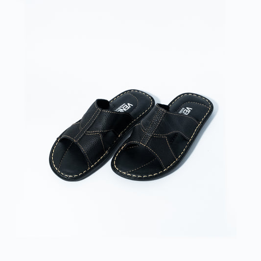 Pair of black sandals on a white background