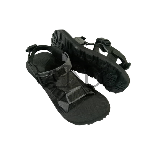 Black sandals with straps on a white background