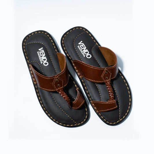 A pair of brown leather braided strap sandals with black cushioned soles, branded with the Vendo Marikina logo.