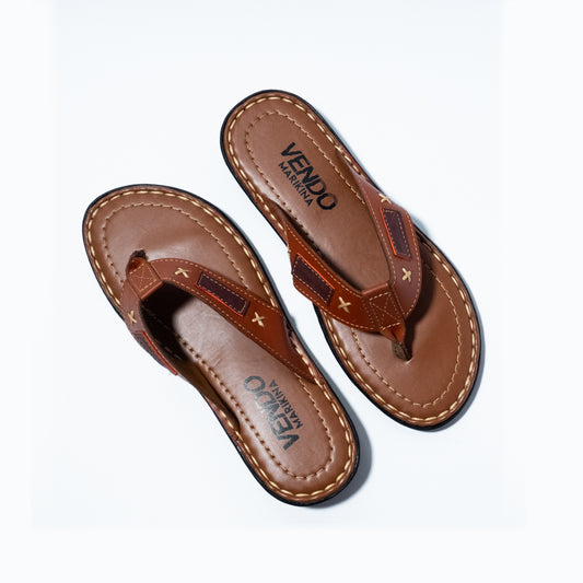 Pair of brown sandals with 'VENDO' branding on a white background