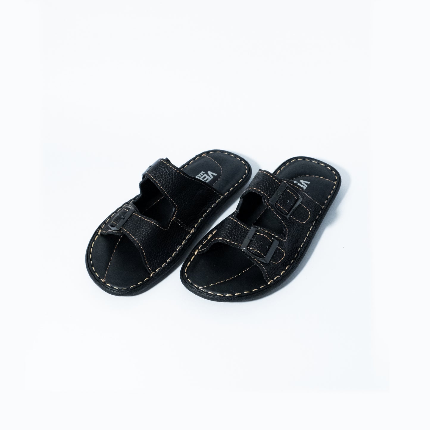 Pair of black sandals with velcro straps on a white background