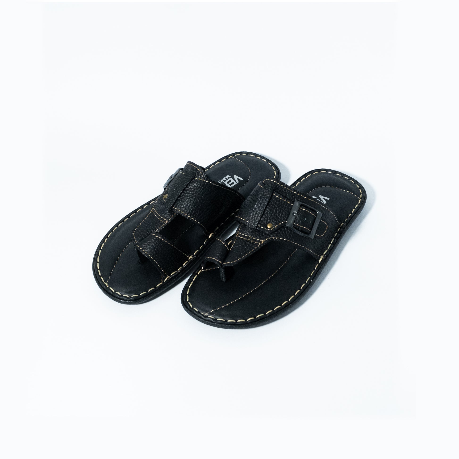Pair of black sandals with straps on a white background
