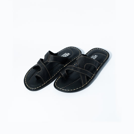 Pair of black sandals on a white background