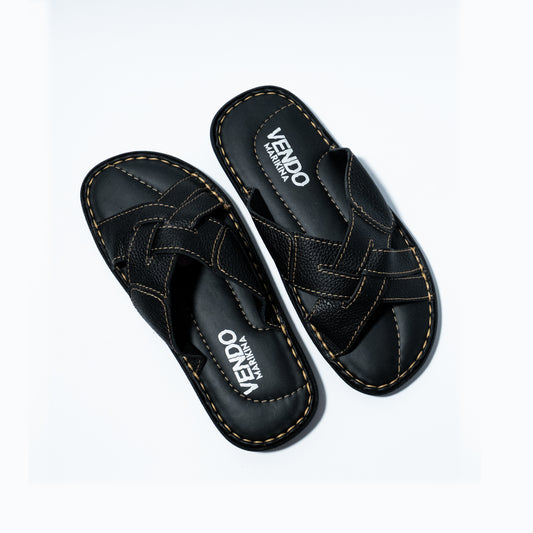 Black sandals with 'VENDO' branding on a white background