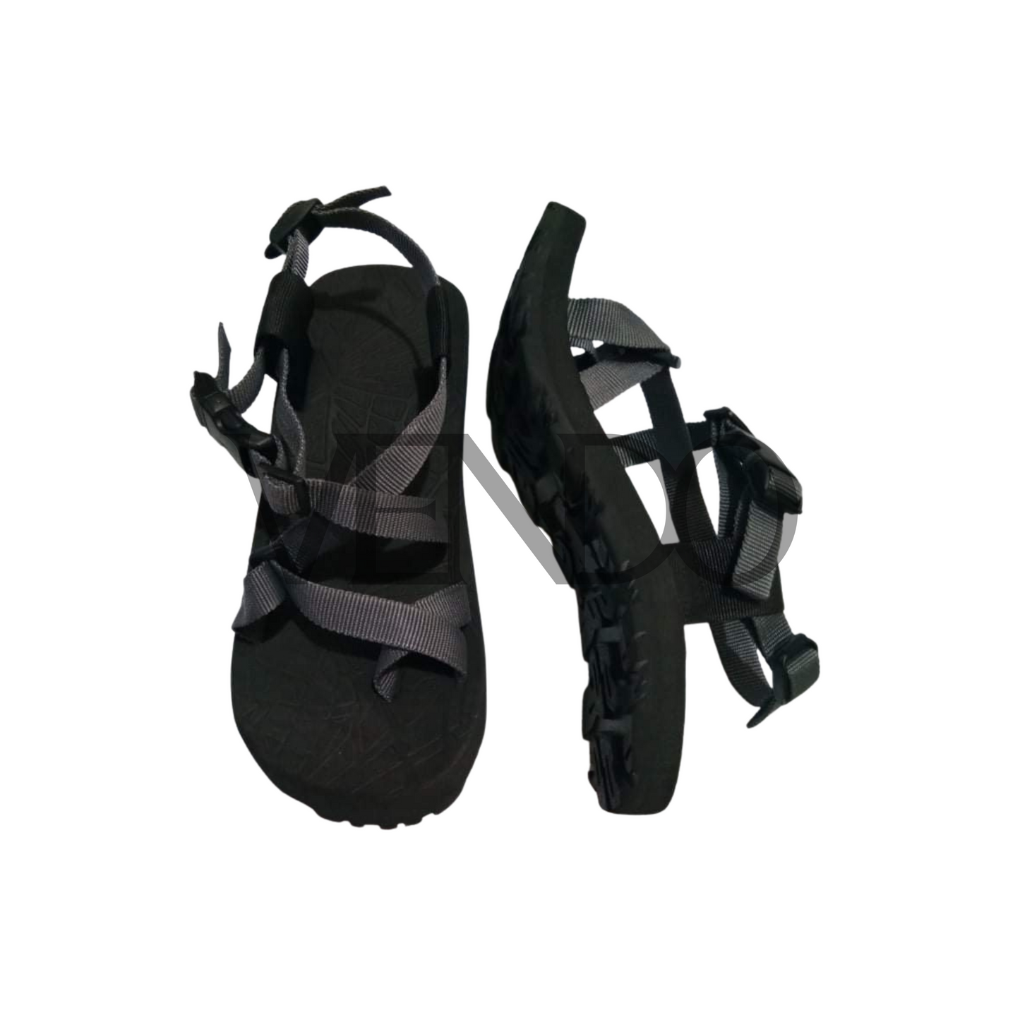 Pair of black sandals with multiple straps on a white background