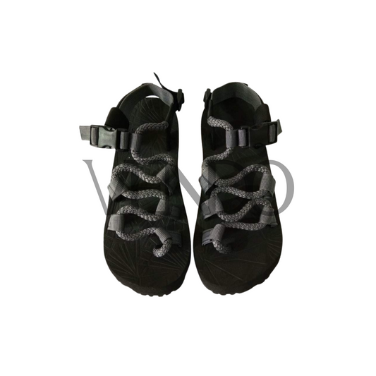 Pair of black and gray hiking sandals on a white background