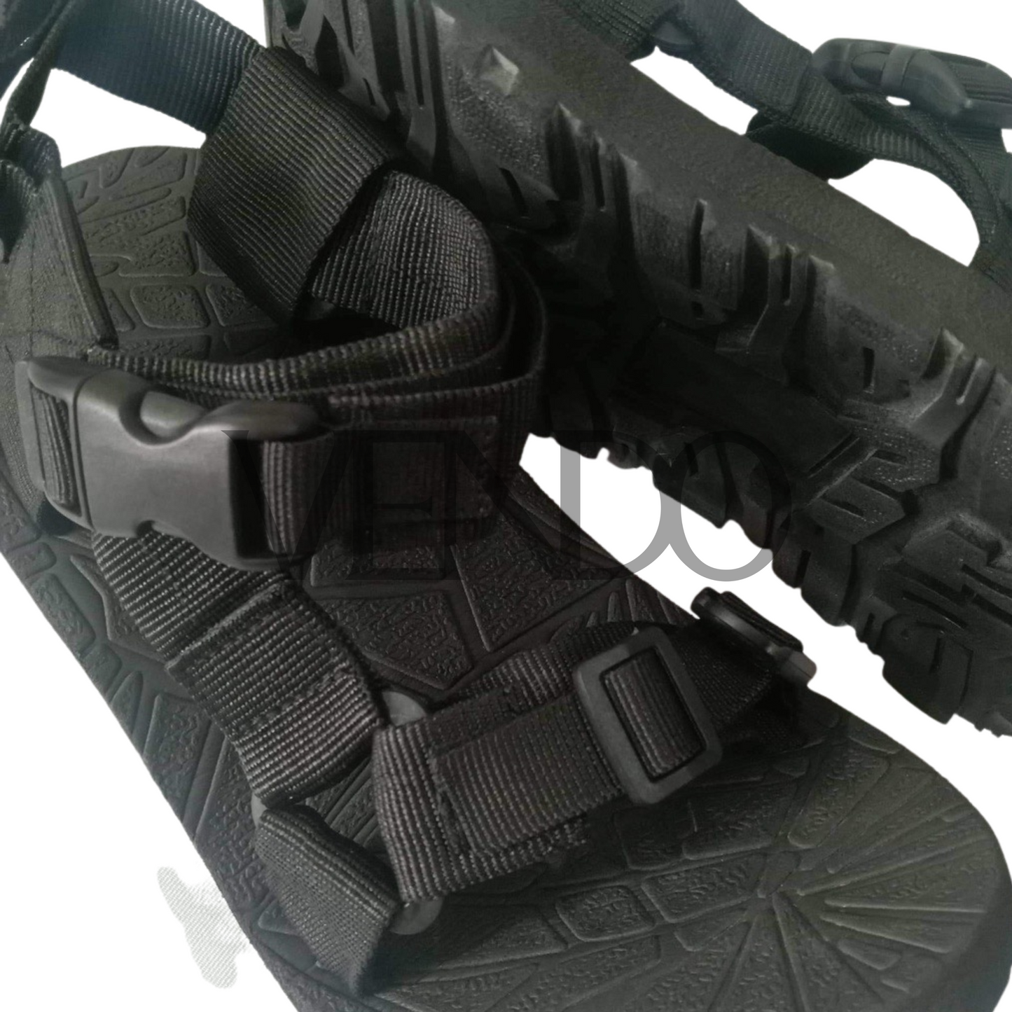 Black sandal with straps on a white background